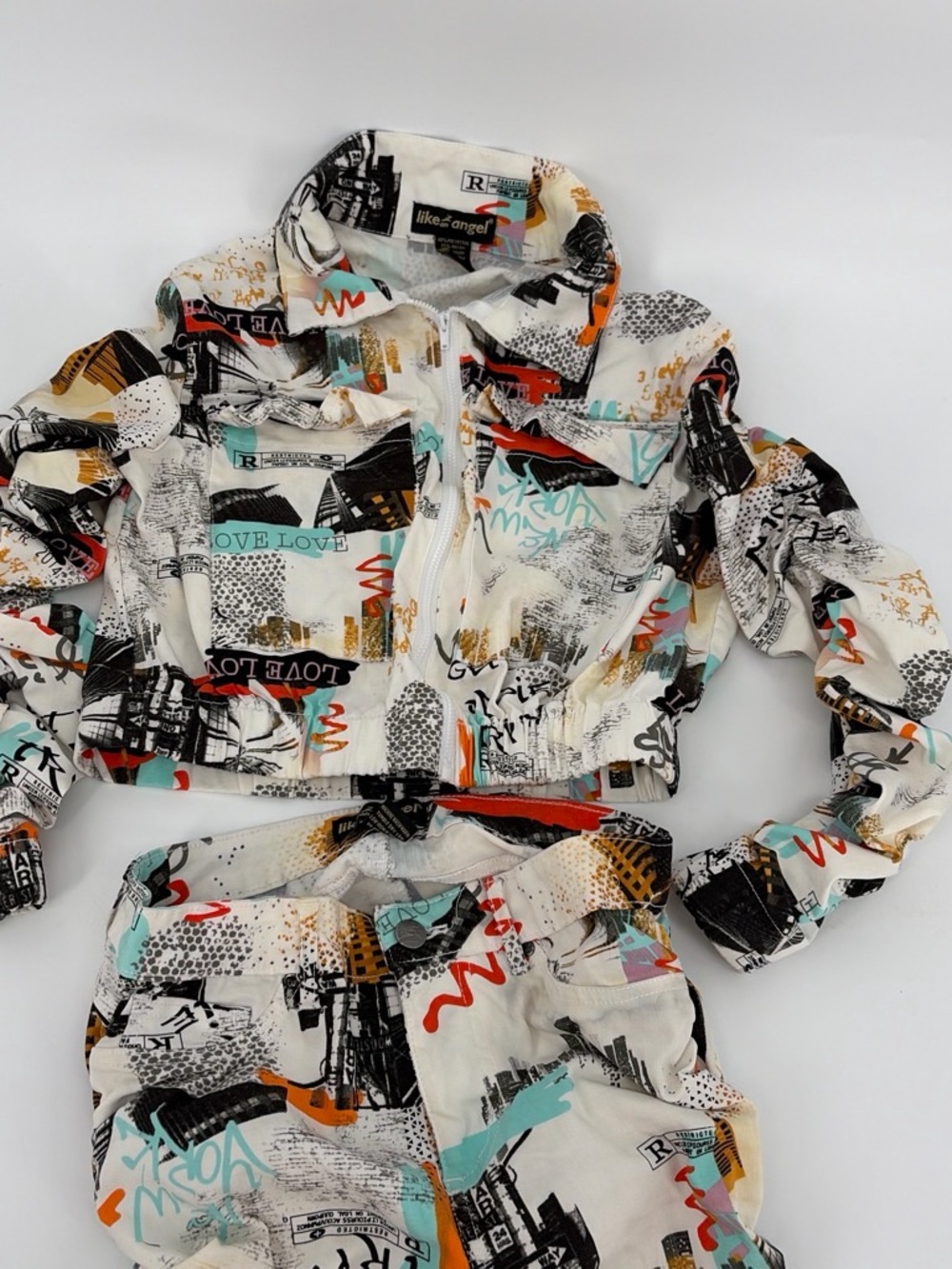 like an angel women’s Cropped Jacket in Black, Teal, Orange & Cream